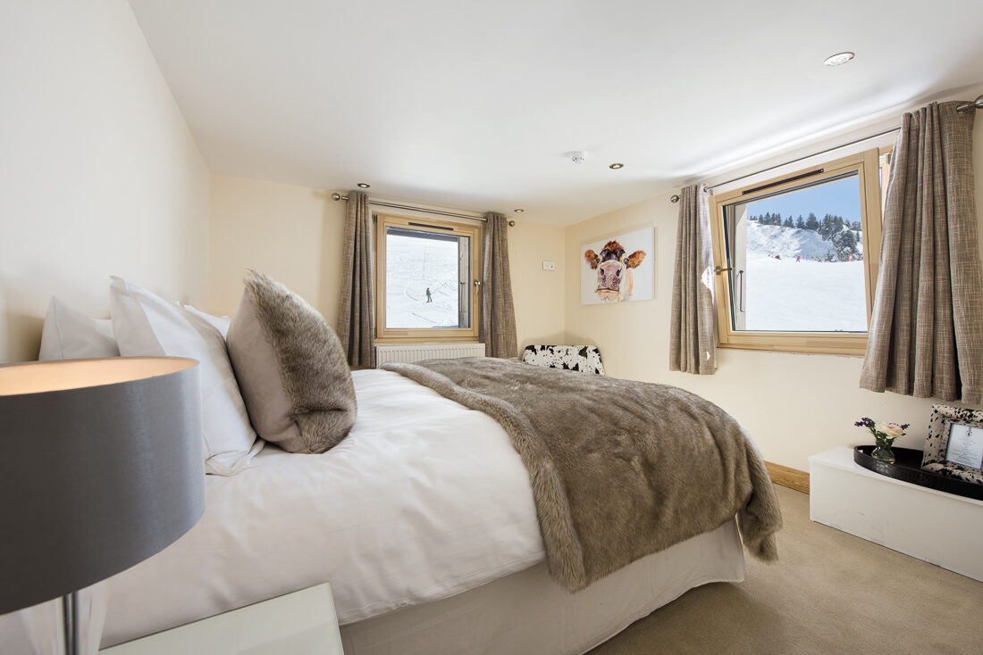 A bedroom at Hotel du Lac